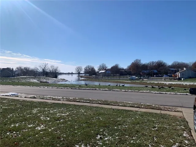 $350,000 | 105 North Lakeshore Drive, Raymore, MO 64083