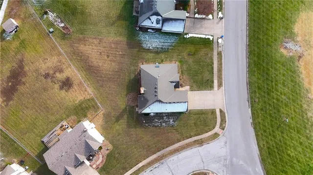 $350,000 | 105 North Lakeshore Drive, Raymore, MO 64083