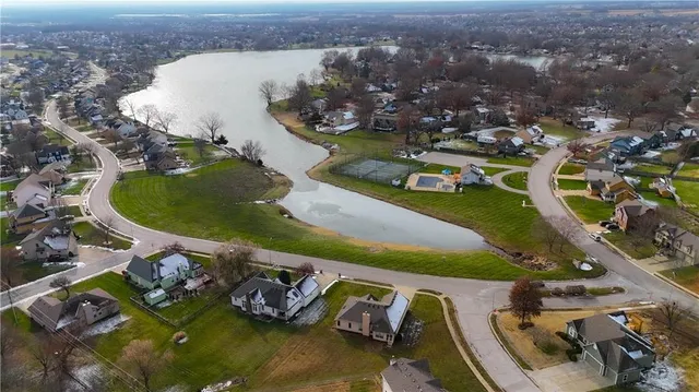 $350,000 | 105 North Lakeshore Drive, Raymore, MO 64083