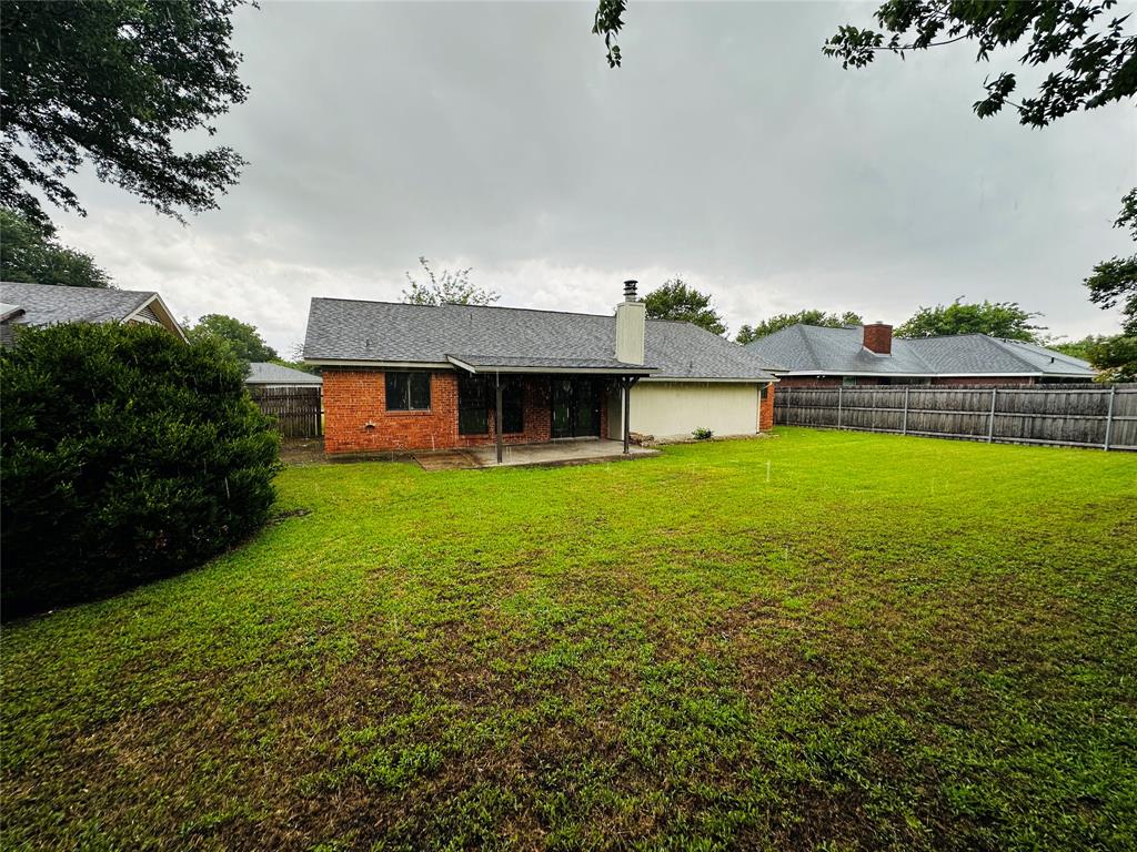 6741 Ridgetop Road North Richland Hills, TX 76182 - Photo 38 of 40 Spacious Backyard
