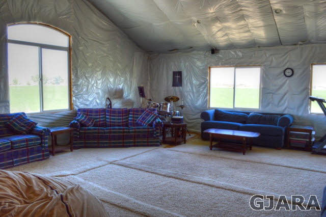 1575 15 Road Loma, CO 81524 - Photo 23 of 30 a living room with furniture and a window