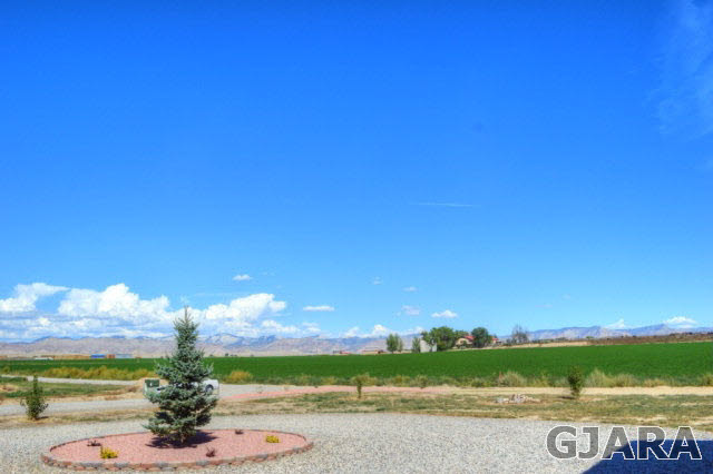 1575 15 Road Loma, CO 81524 - Photo 25 of 30 a view of a city with an ocean