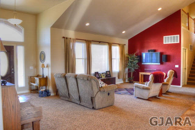 1575 15 Road Loma, CO 81524 - Photo 5 of 30 a living room with furniture and a large window