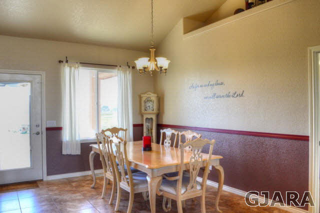1575 15 Road Loma, CO 81524 - Photo 8 of 30 a view of a dining room with furniture and wooden floor
