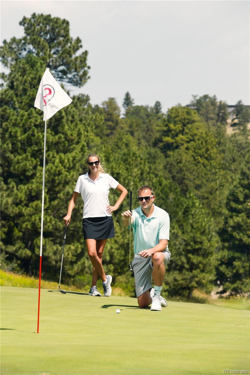 7921 Forest Keep Circle Parker, CO 80134 - Photo 21 of 36 a front view of a house with a yard