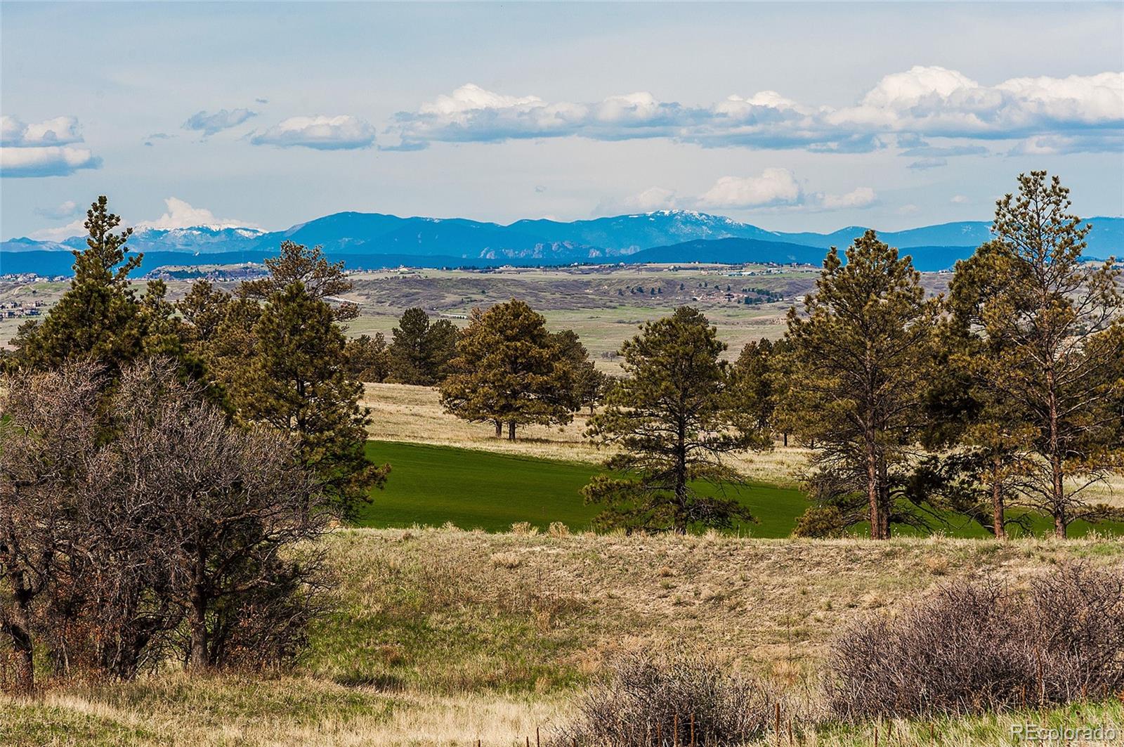 7921 Forest Keep Circle Parker, CO 80134 - Photo 24 of 36 a view of a lake with a lake