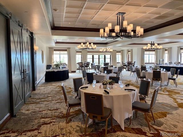 7921 Forest Keep Circle Parker, CO 80134 - Photo 29 of 36 a outdoor dining area with lots of furniture and chandelier