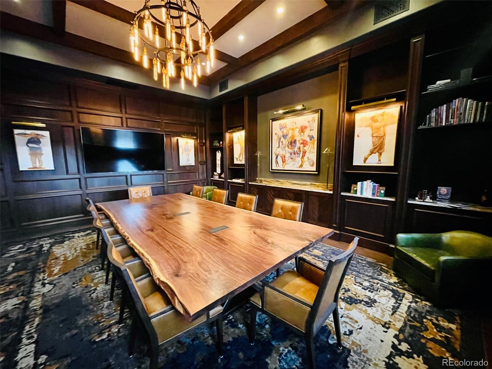 7921 Forest Keep Circle Parker, CO 80134 - Photo 30 of 36 a room with furniture and flat screen tv