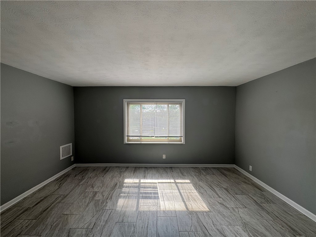 2358 South Patterson Boulevard, Unit 6 Kettering, OH 45409 - Photo 3 of 9 Bright room with natural light and a window.