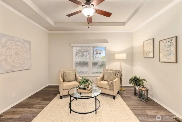 a living room with furniture and a window