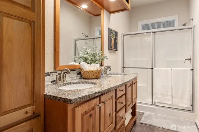 a kitchen with a sink and cabinets