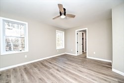 13 Showell Pond Road Sandown, NH 03873 - Photo 22 of 42 a view of an empty room with a window
