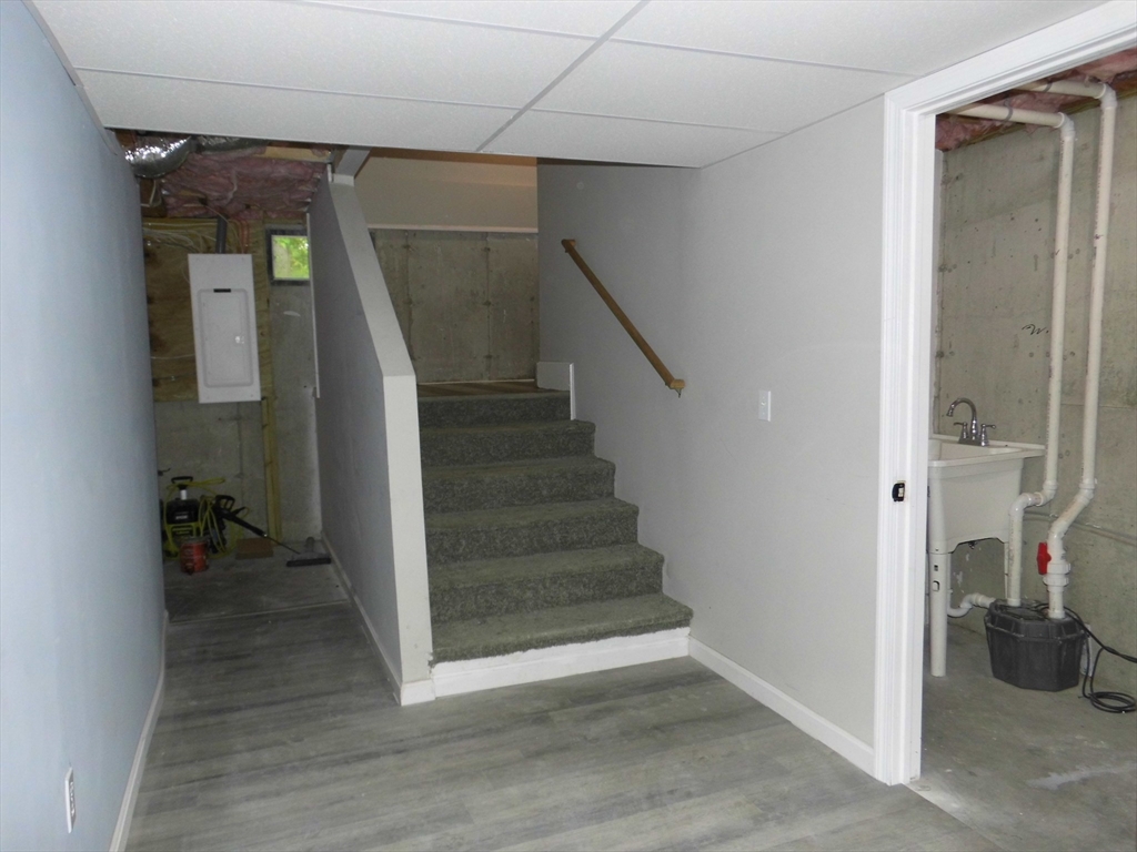 13 Showell Pond Road Sandown, NH 03873 - Photo 31 of 42 a view of entryway and hall with wooden floor