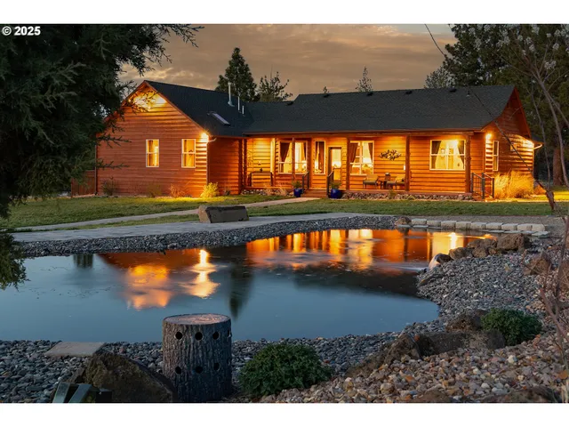 a view of a lake with a big yard