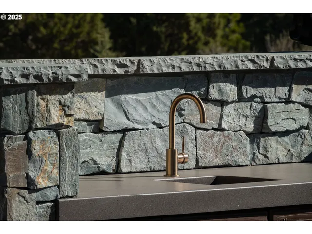 a view of a swimming pool with a yard