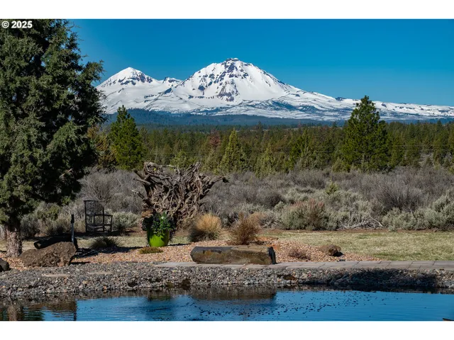 a kitchen with stainless steel appliances granite countertop a sink counter space and cabinets