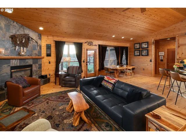 a bedroom with a bed and a flat tv screen