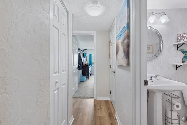 a view of hallway with washer and dryer