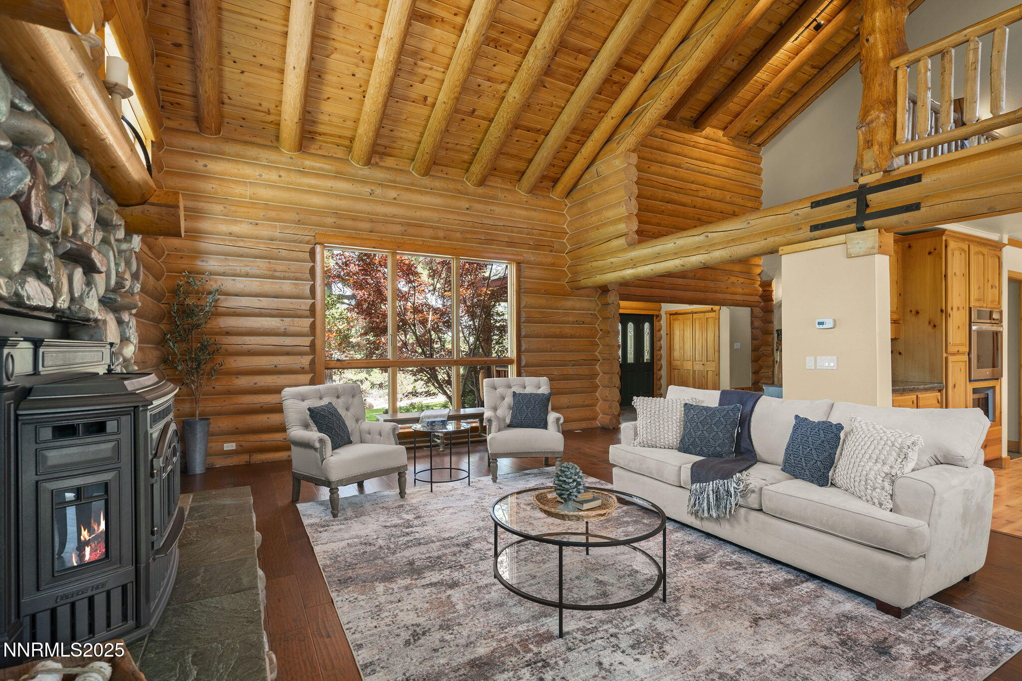 4684 Old Clear Creek Road Carson City, NV 89705 - Photo 14 of 46 a living room with furniture and a fireplace