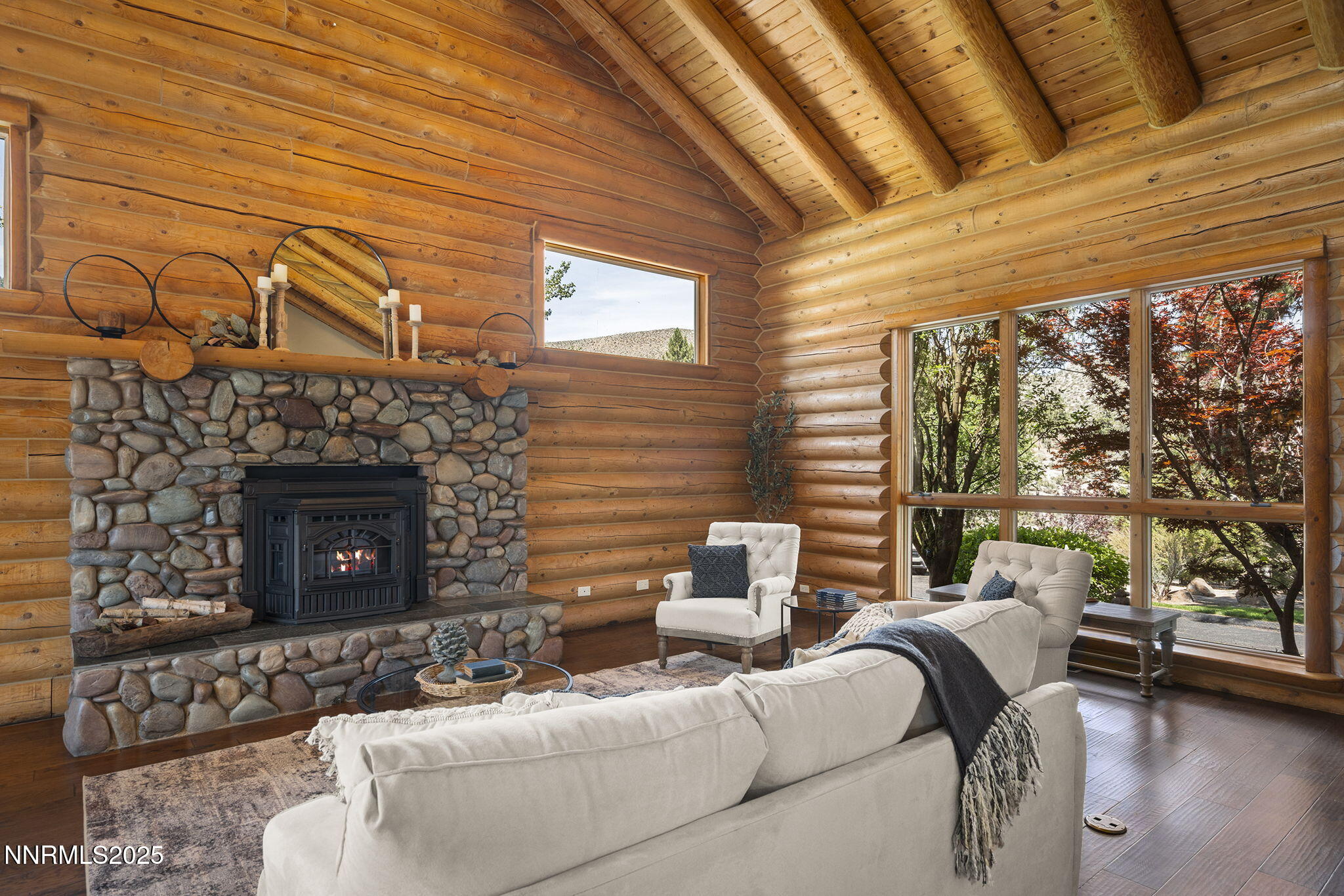 4684 Old Clear Creek Road Carson City, NV 89705 - Photo 15 of 46 a living room with furniture and a fireplace