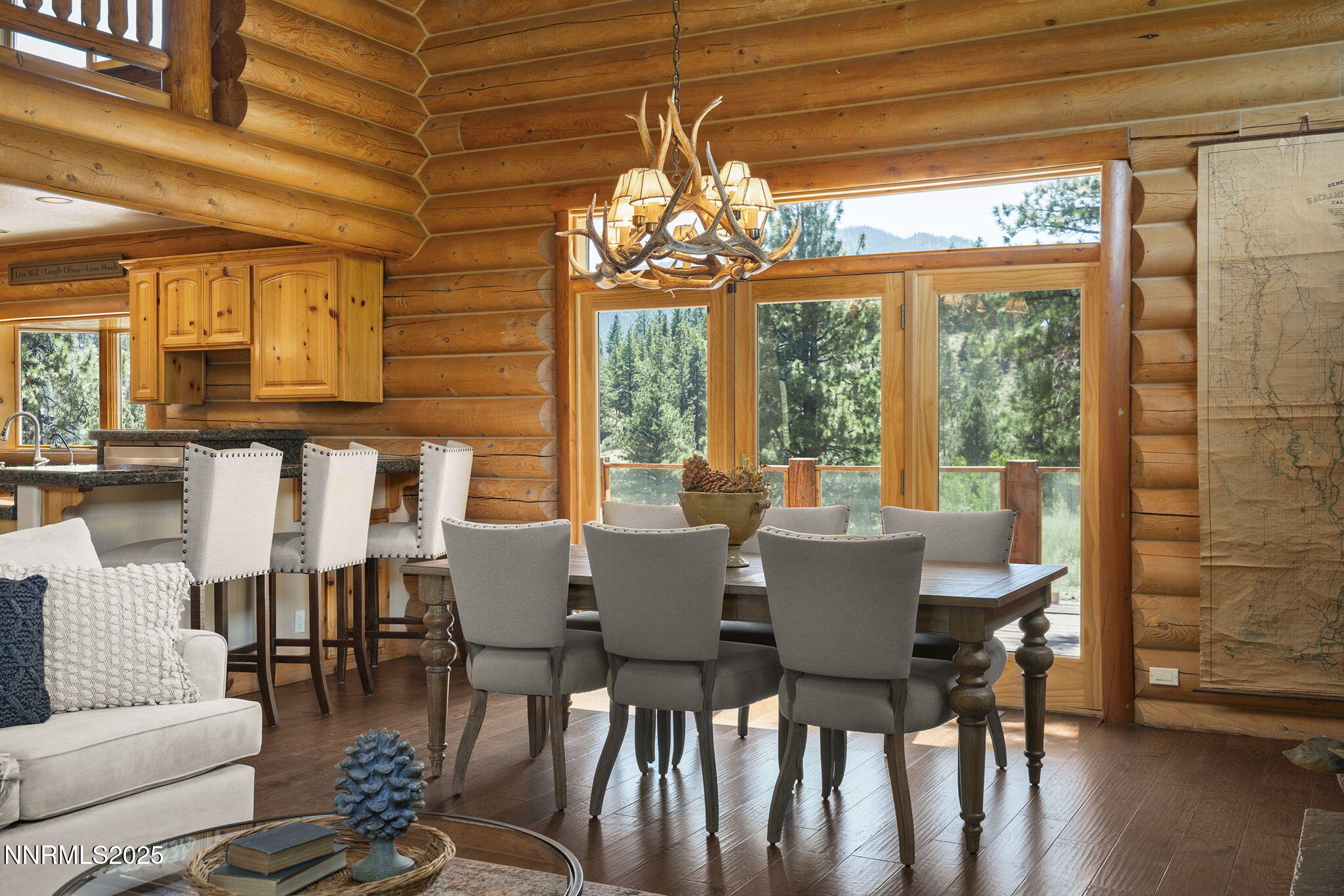 4684 Old Clear Creek Road Carson City, NV 89705 - Photo 18 of 46 a view of a dining room with furniture wooden floor and chandelier