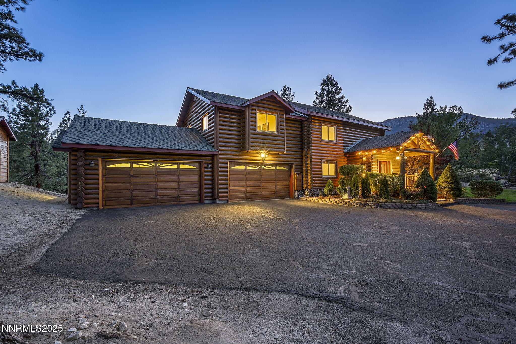 4684 Old Clear Creek Road Carson City, NV 89705 - Photo 2 of 46 a front view of a house with a yard and garage