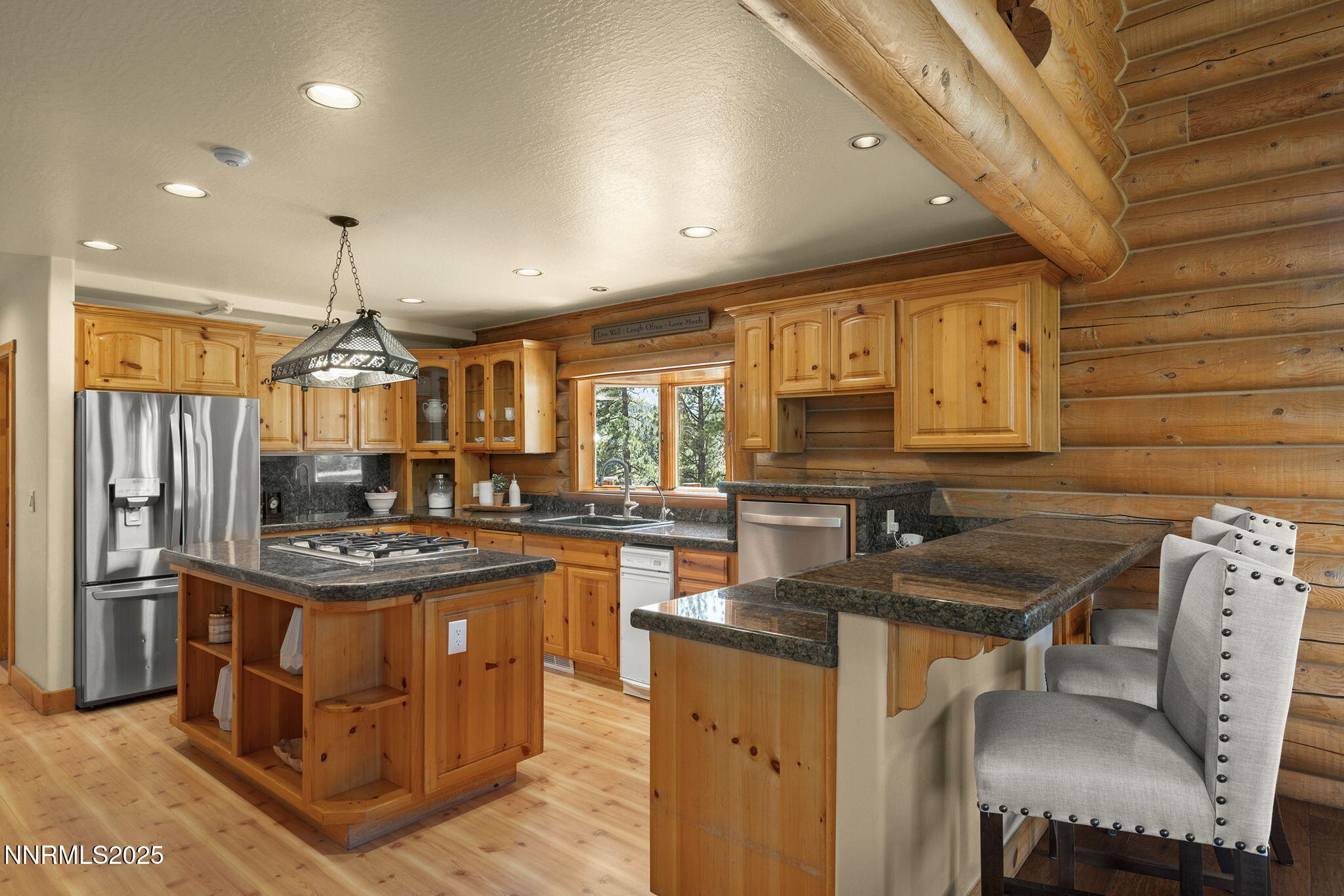 4684 Old Clear Creek Road Carson City, NV 89705 - Photo 20 of 46 a kitchen with stainless steel appliances granite countertop a sink a stove and a refrigerator