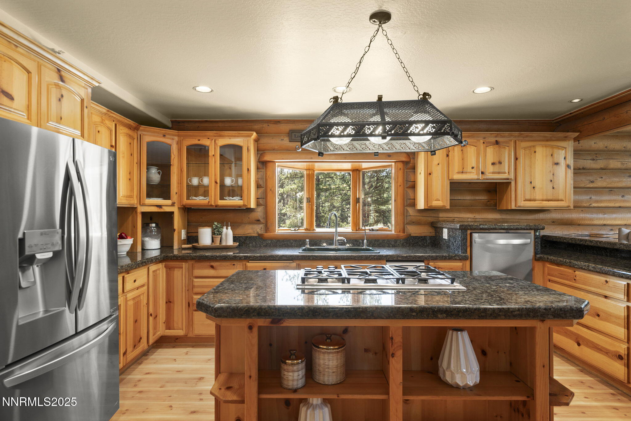 4684 Old Clear Creek Road Carson City, NV 89705 - Photo 21 of 46 a kitchen with kitchen island granite countertop a stove and a sink