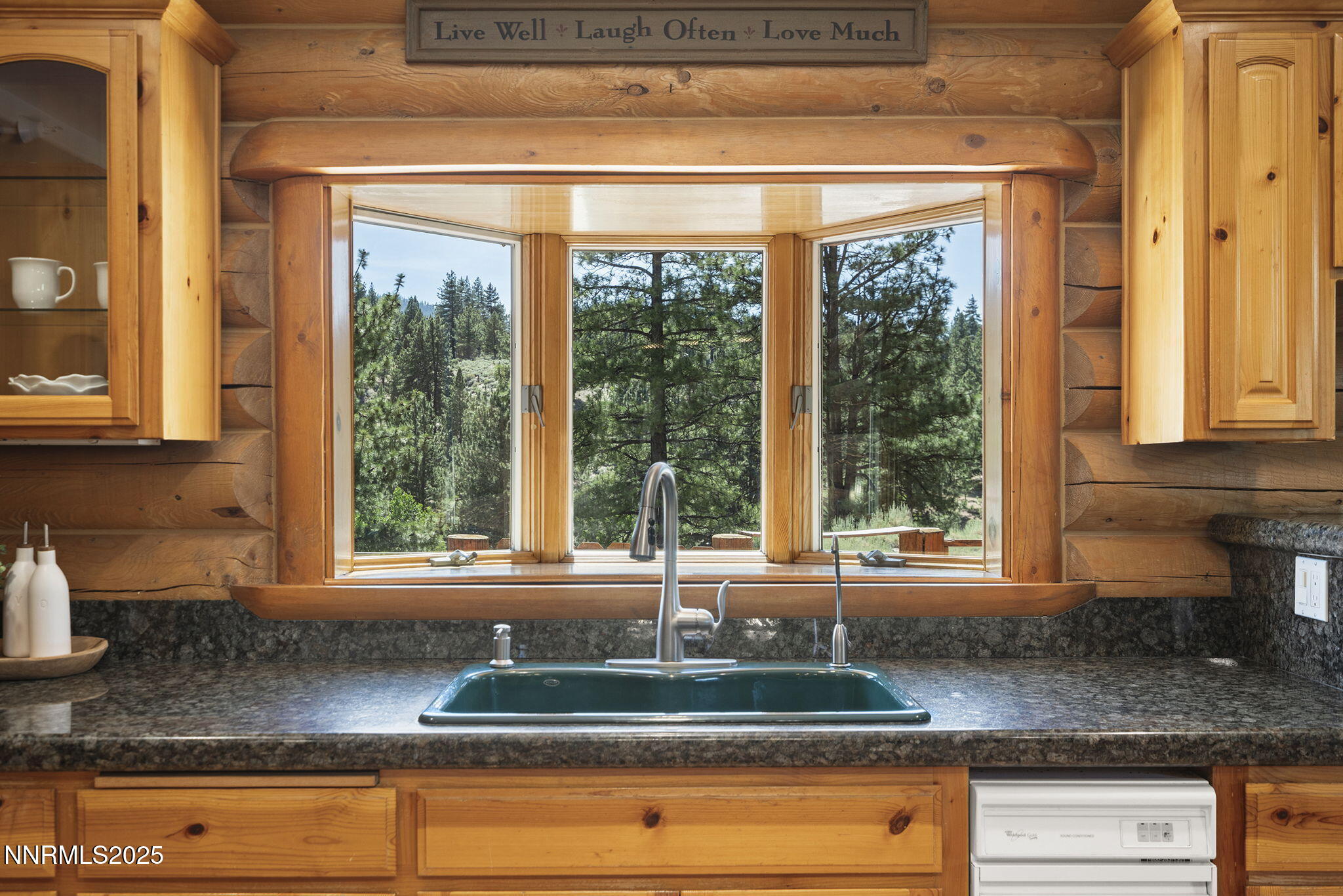 4684 Old Clear Creek Road Carson City, NV 89705 - Photo 23 of 46 a kitchen with granite countertop a sink and a window