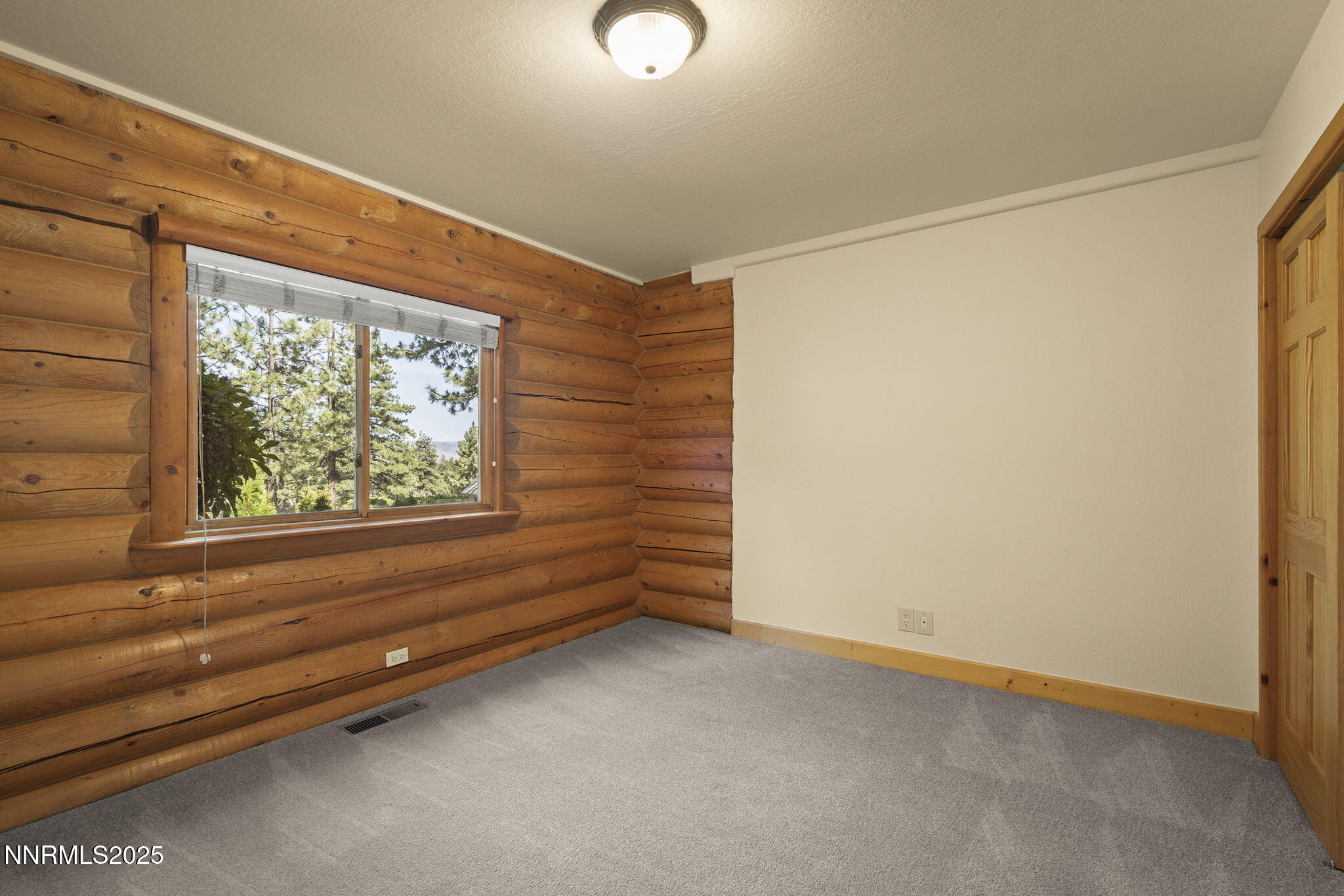 4684 Old Clear Creek Road Carson City, NV 89705 - Photo 33 of 46 a view of an empty room with a window