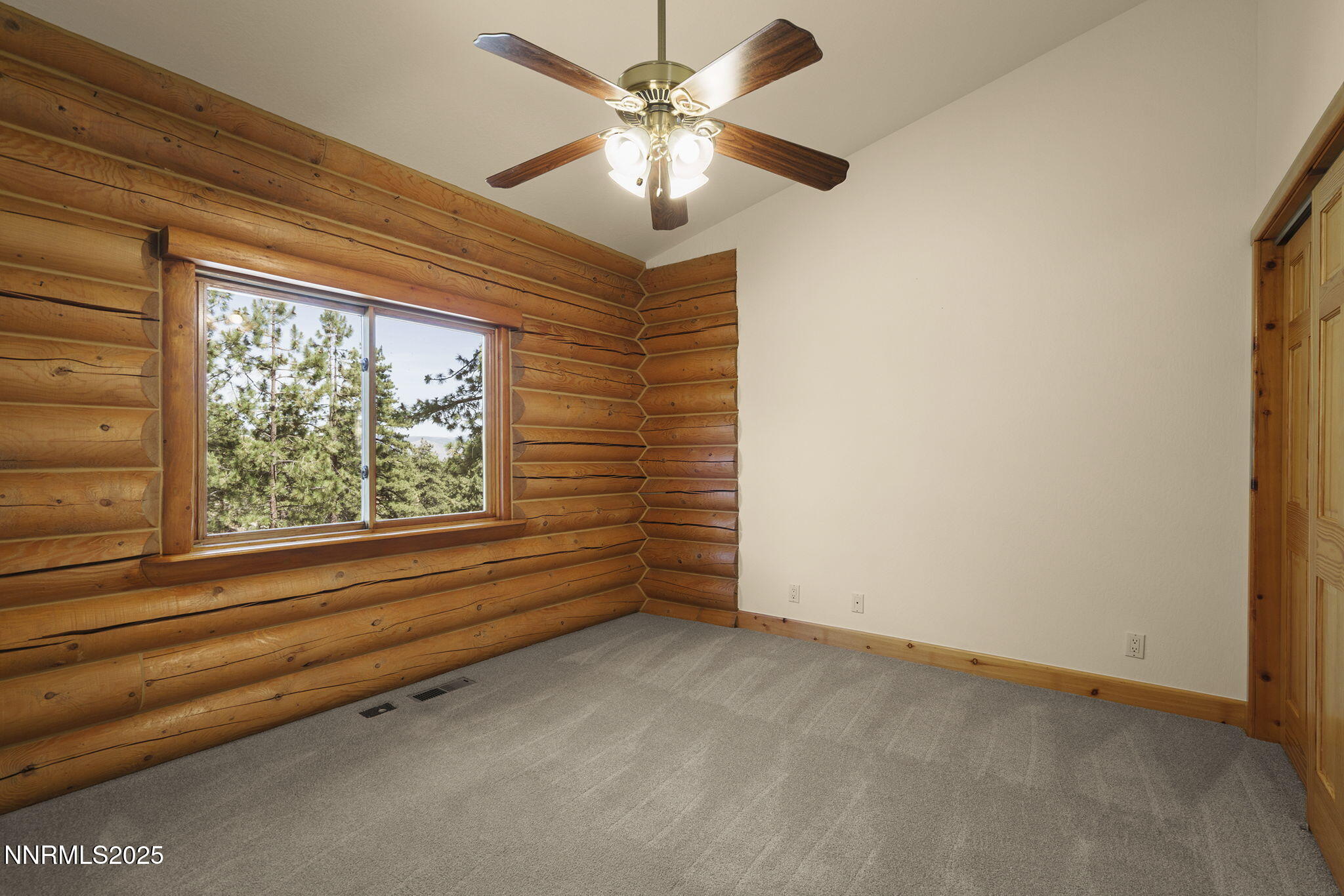 4684 Old Clear Creek Road Carson City, NV 89705 - Photo 35 of 46 a view of room with window and a ceiling fan