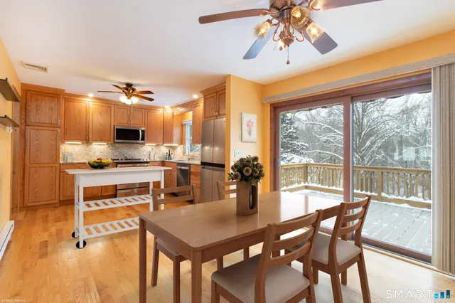 a kitchen with a sink and a stove top oven
