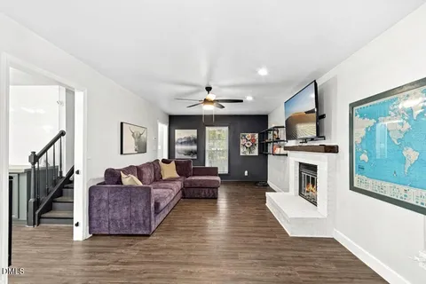 a view of a chair and table in the balcony