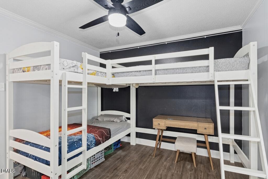 106 Village Court Garner, NC 27529 - Photo 15 of 38 a bedroom with bunk beds and a window