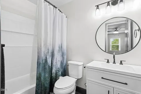 a bedroom with bunk beds and a window