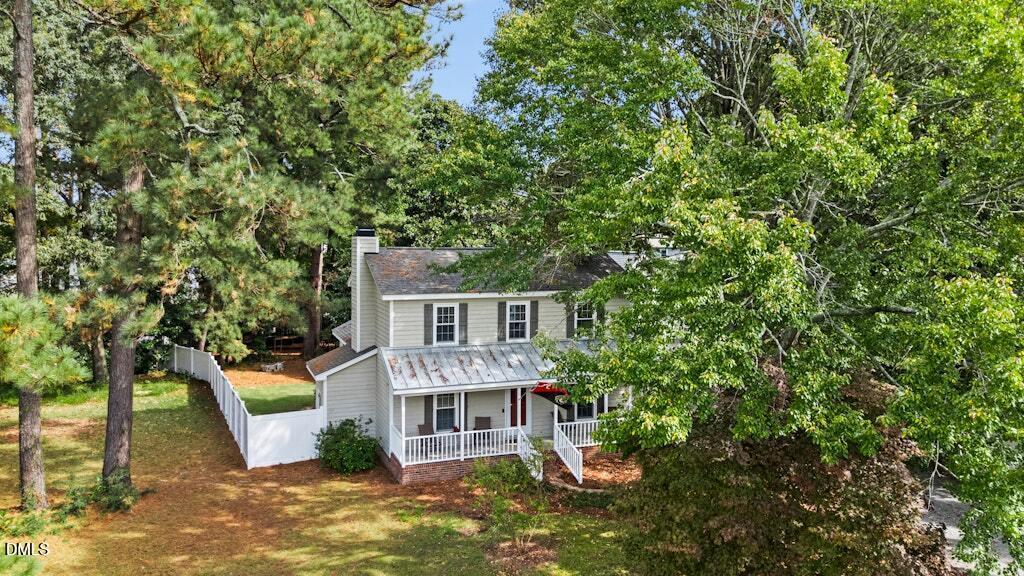 106 Village Court Garner, NC 27529 - Photo 30 of 38 a view of a house with roof deck