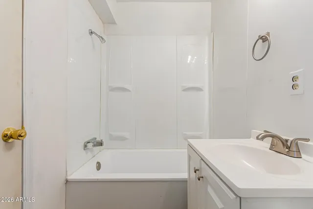 a bathroom with a sink and a bathtub