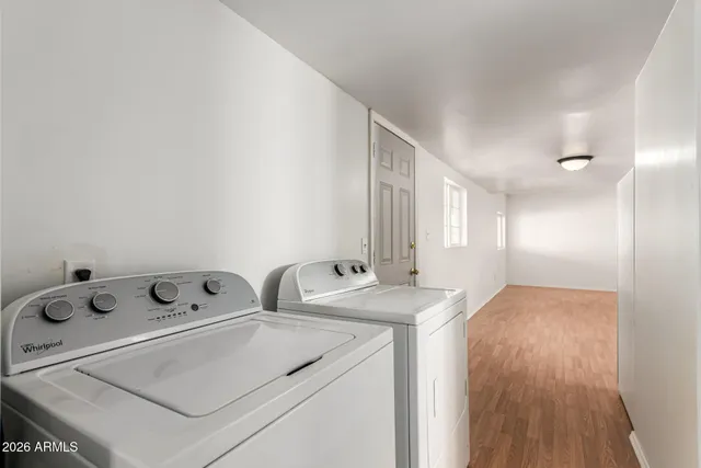 a utility room with dryer and washer
