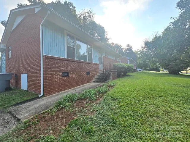 a view of a back yard of the house