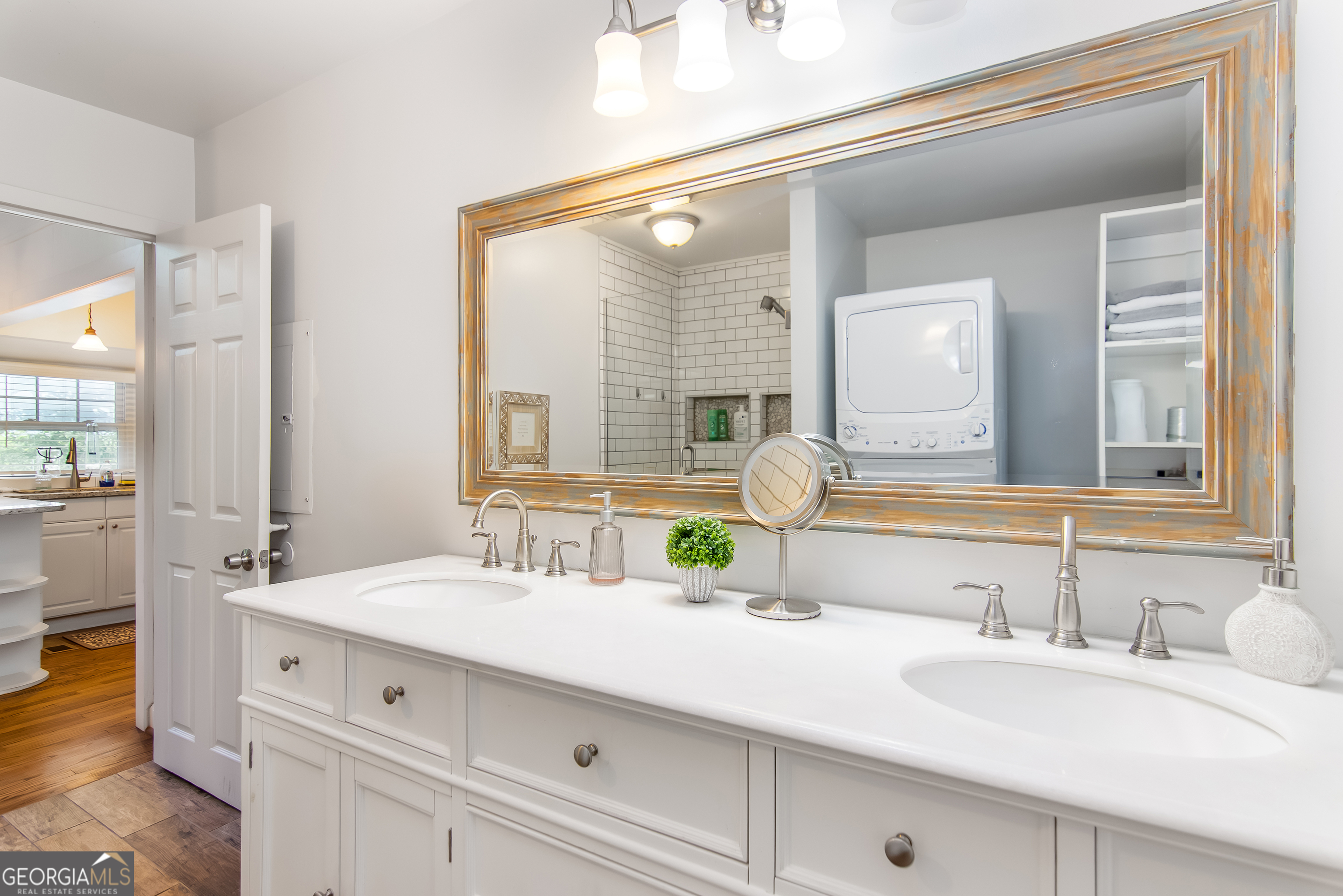 1056 Sky Hawk Mountain Road Hiawassee, GA 30546 - Photo 18 of 50 a bathroom with a sink and a mirror