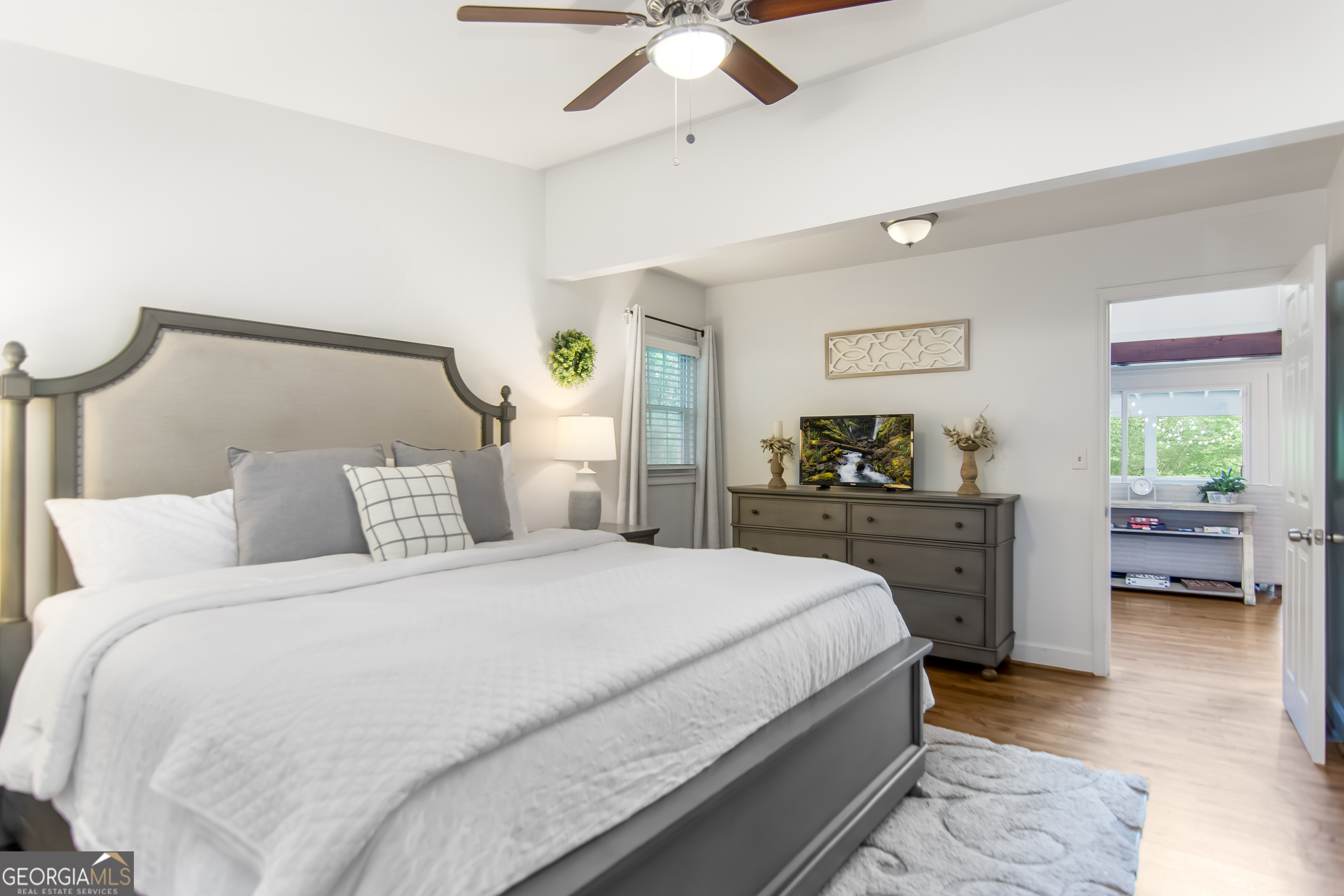 1056 Sky Hawk Mountain Road Hiawassee, GA 30546 - Photo 21 of 50 a bedroom with a bed and dresser