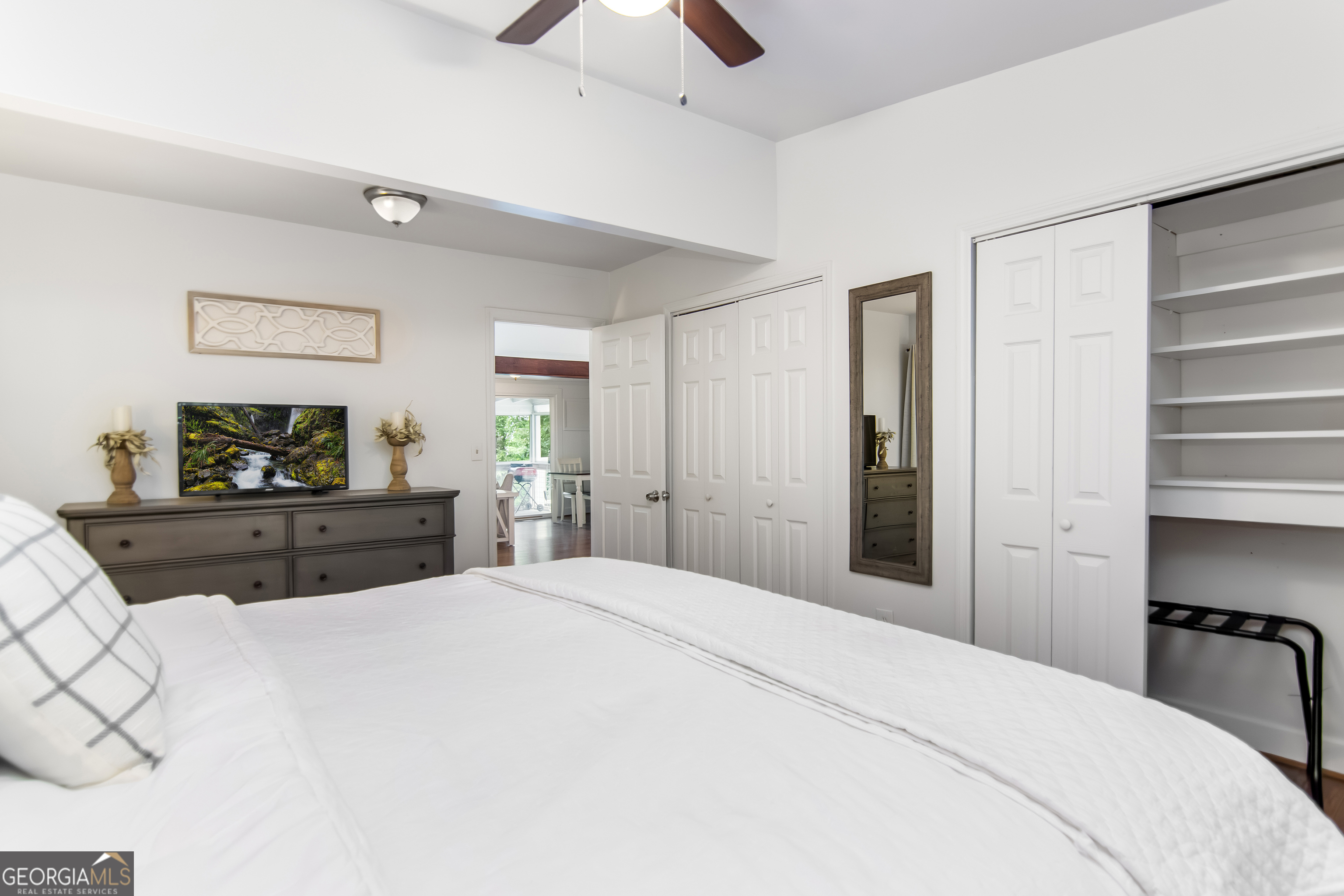 1056 Sky Hawk Mountain Road Hiawassee, GA 30546 - Photo 23 of 50 a bedroom with a bed and a dresser