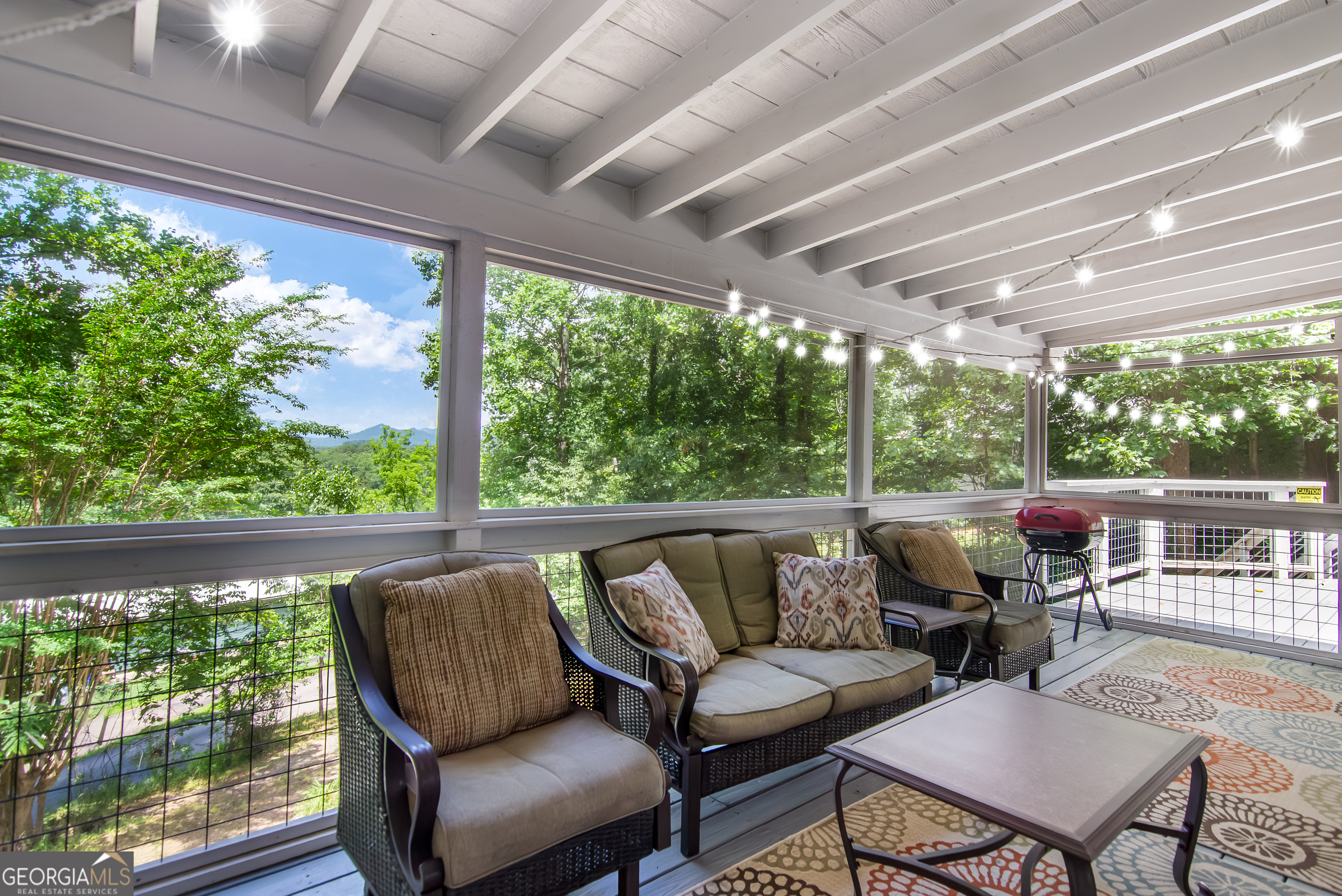 1056 Sky Hawk Mountain Road Hiawassee, GA 30546 - Photo 31 of 50 a outdoor living space with furniture and garden view