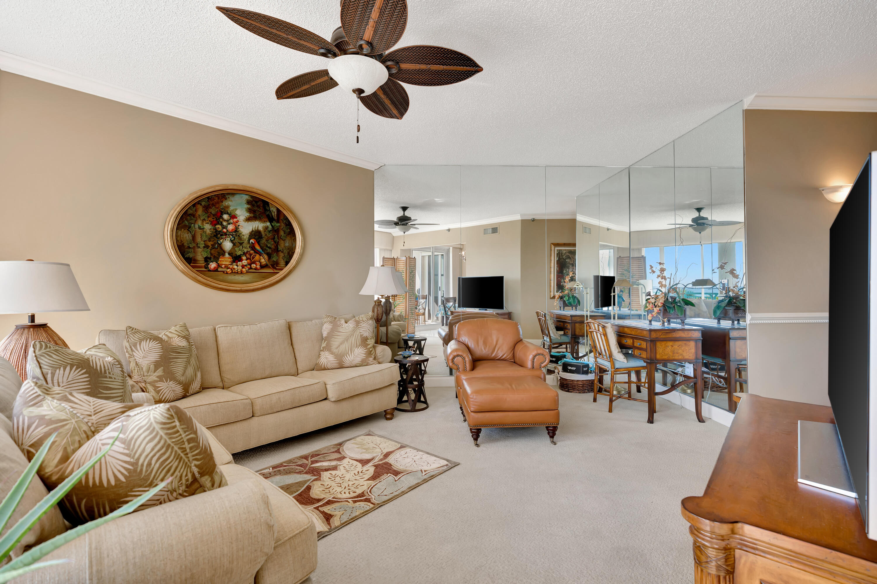 2000 Florida A1A, Unit N302 Jupiter, FL 33477 - Photo 19 of 65 a living room with furniture kitchen view and a chandelier