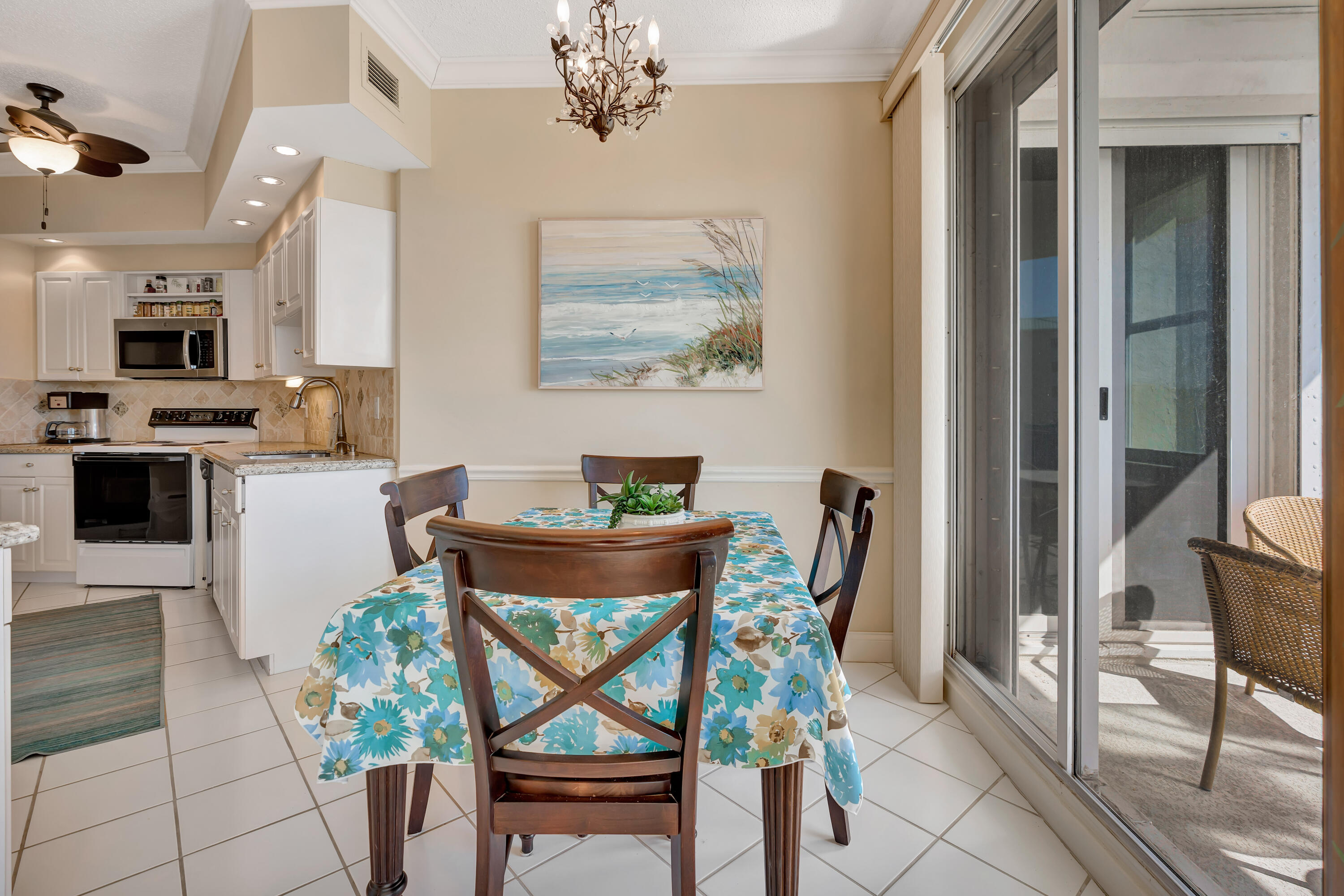 2000 Florida A1A, Unit N302 Jupiter, FL 33477 - Photo 26 of 65 a dining room with furniture and window