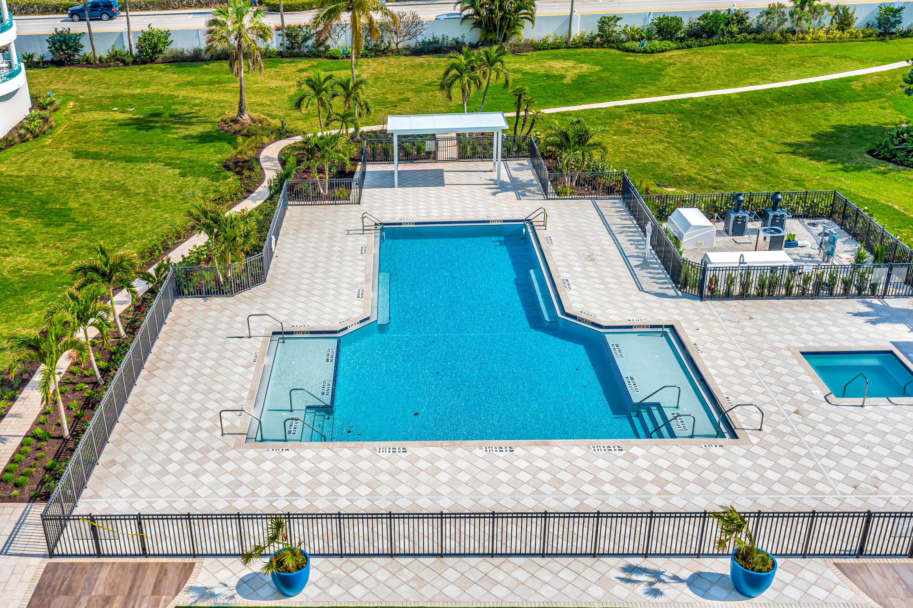 2000 Florida A1A, Unit N302 Jupiter, FL 33477 - Photo 64 of 65 a view of swimming pool with a patio