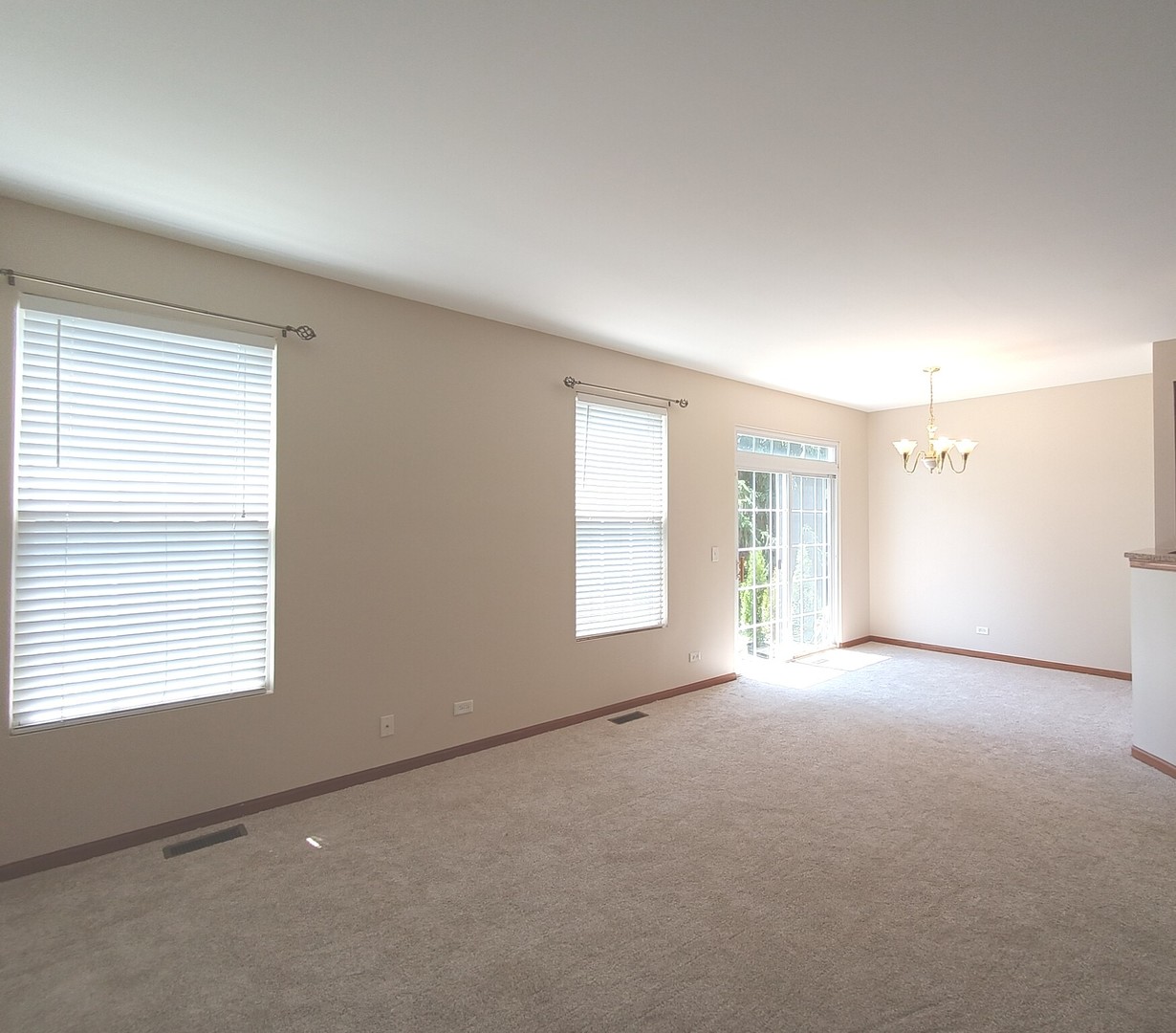 24213 Walnut Circle Plainfield, IL 60585 - Photo 4 of 15 a view of an empty room with a window