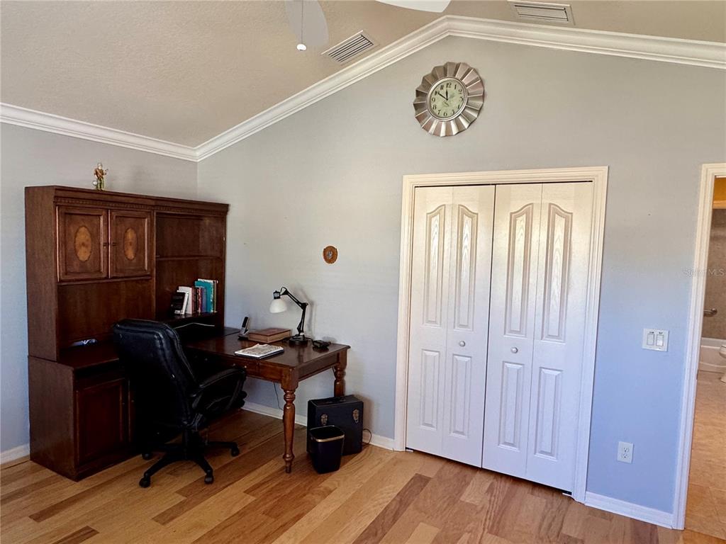 3436 Countryside Path The Villages, FL 32163 - Photo 23 of 31 a view of a workspace with furniture and wooden floor