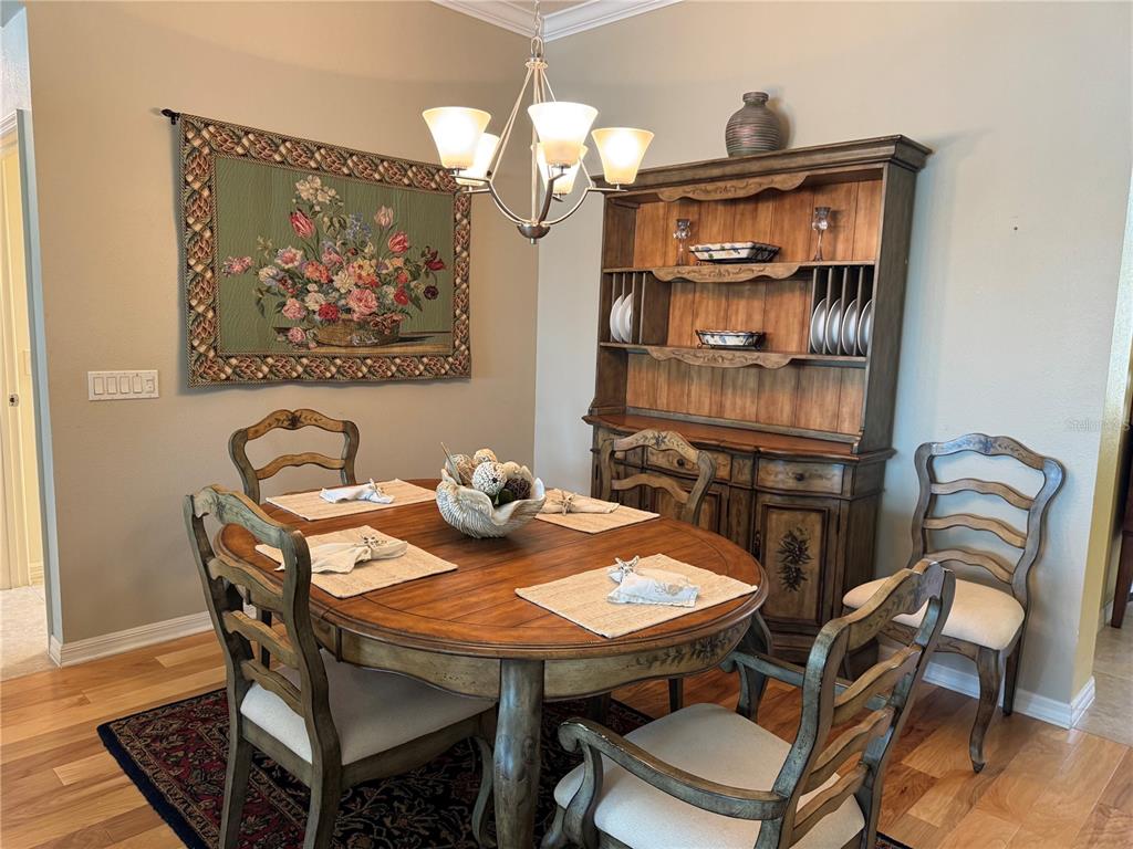 3436 Countryside Path The Villages, FL 32163 - Photo 3 of 31 a view of a dining room with furniture