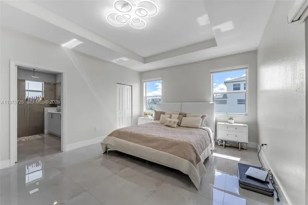 a bathroom with a sink double vanity and shower
